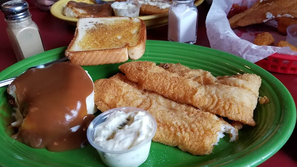 Fried Catfish Dinner All You Can Eat Served with Mashed Potatoes and Gravy& Side Salad